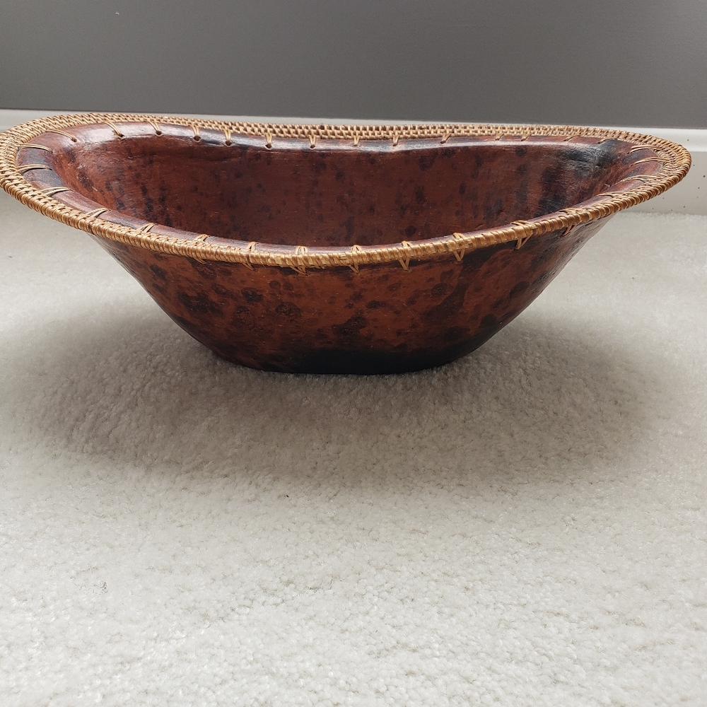 Terracota oval bowl with rattan. Made in Indonesia